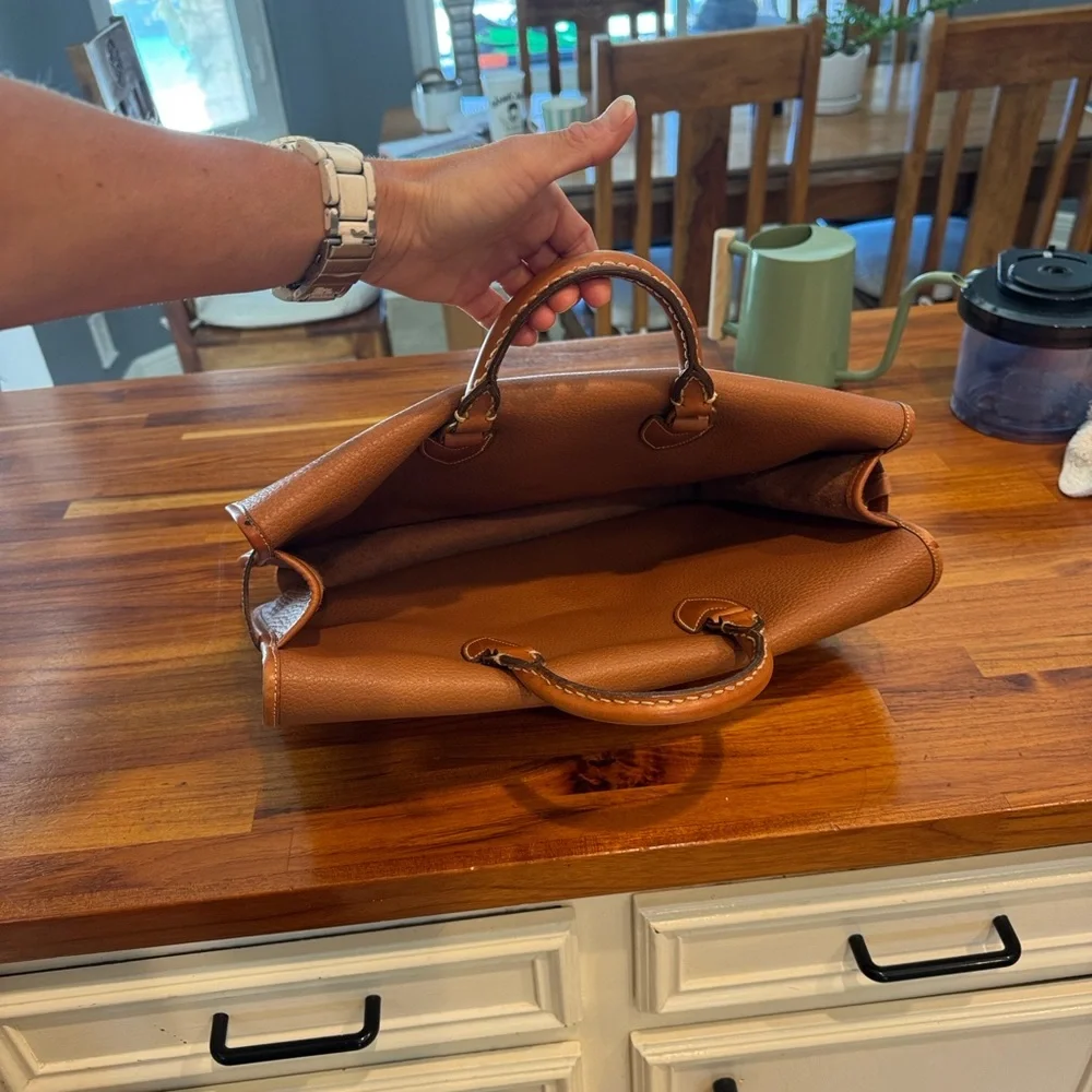 Vintage camel colored Dooney and Bourke all weather leather briefcase/laptop bag